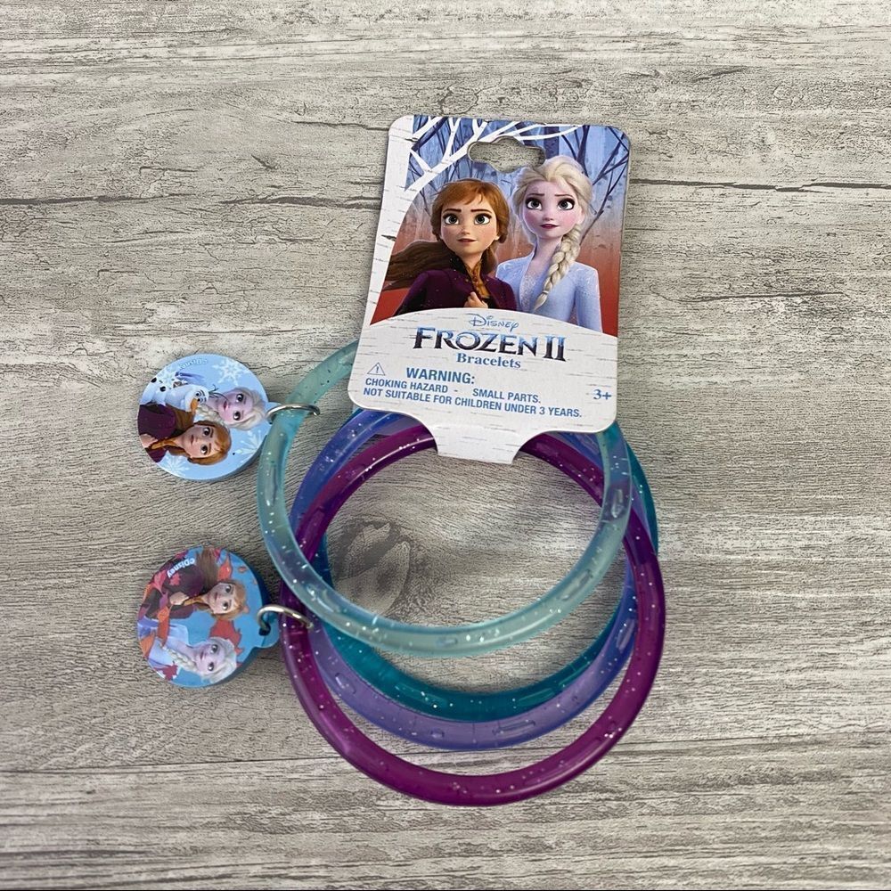 NWT Frozen II three piece bracelet with charms
